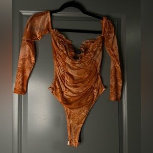 Pretty little thing long sleeve orange mesh body suit